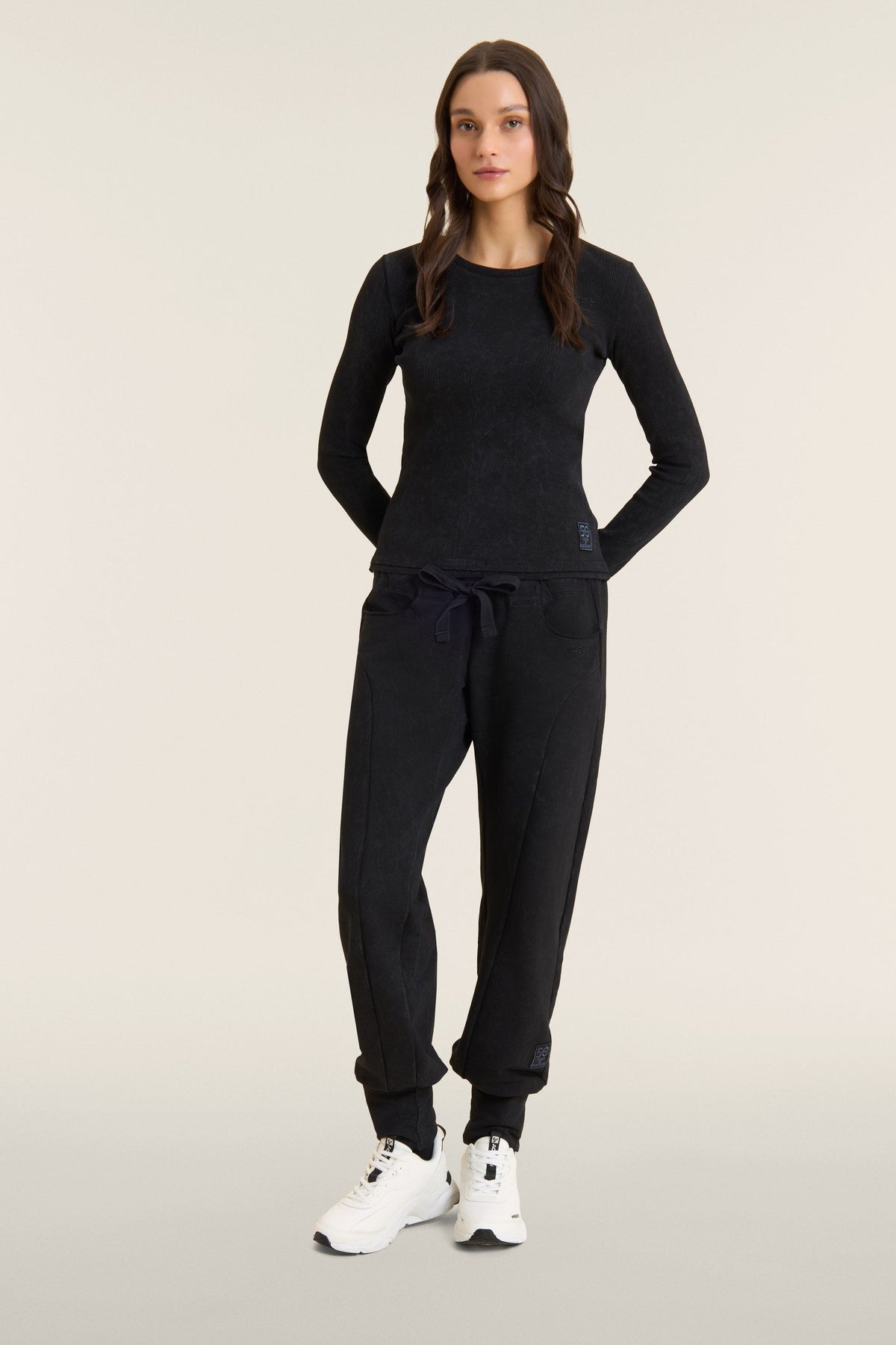 Washed joggers with 50 Years of Movement patch - Black